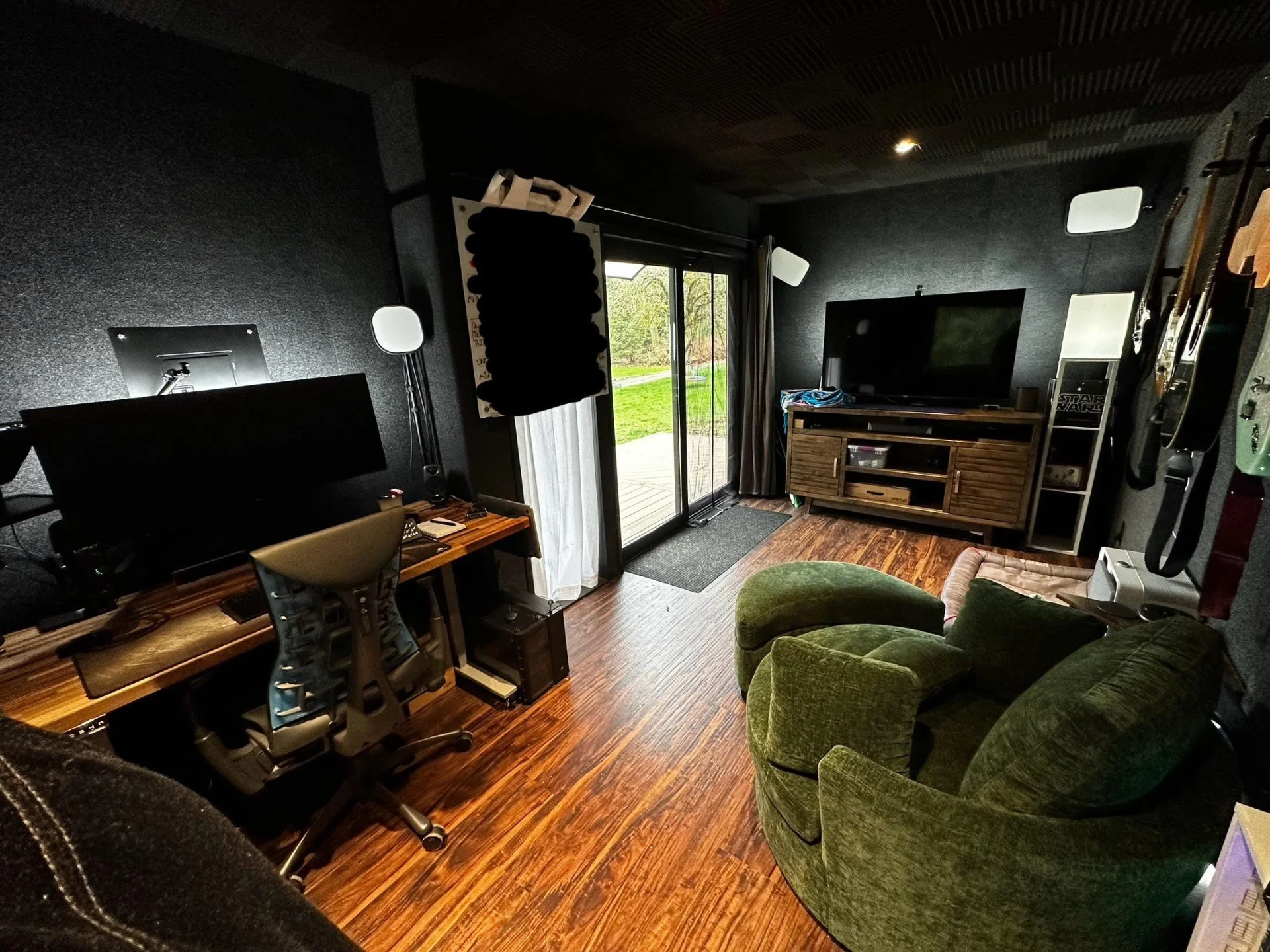 Climate-controlled backyard studio used as a gaming and hobby room